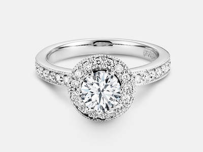 The Victoria style engagement ring set with 31 round brilliant cut side diamonds features a 0.40 carat GIA certified round brilliant center, I color, SI1 clarity.  $4100.00