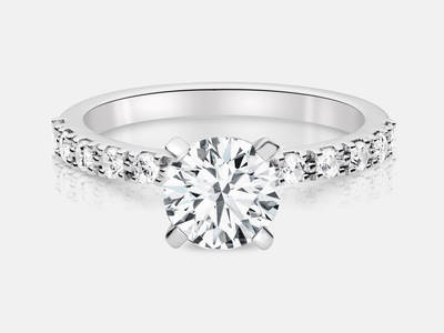 Regis style diamond engagement ring set with 0.28 carats of prong set side diamonds.  Center stone sold separate.  $1300.00