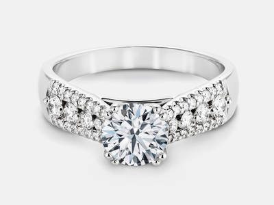 Mya style diamond engagement ring set with 0.40 carats of side diamonds.  Center stone sold separate.  $2450.00