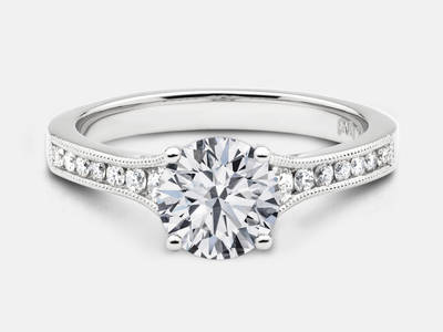 The Heather style diamond engagement ring set with 0.27 carats of round brilliant cut side diamonds.  Center stone sold separate.  $1550.00